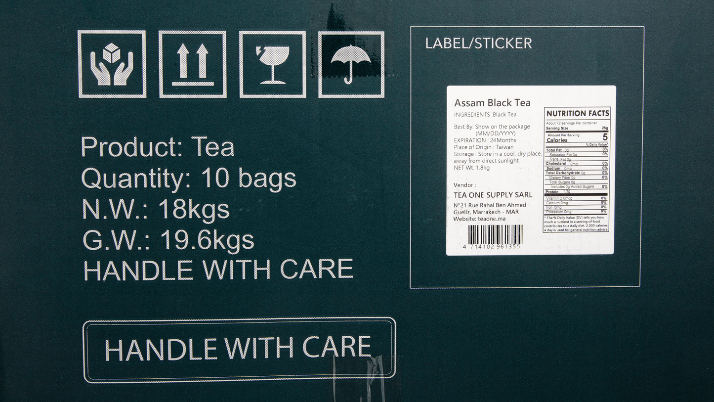 Carton side label for TEA ONE Assam Black Tea, 10 × 1.8 kg foil packs, origin and nutrition facts visible.